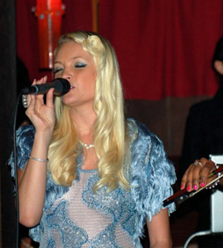 Performing at a Breast Cancer Awareness Charity Event in Beverly Hills, California.